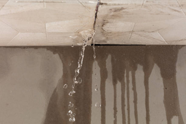 Professional Flood Damage Cleanup technician working in Spring Glen, PA